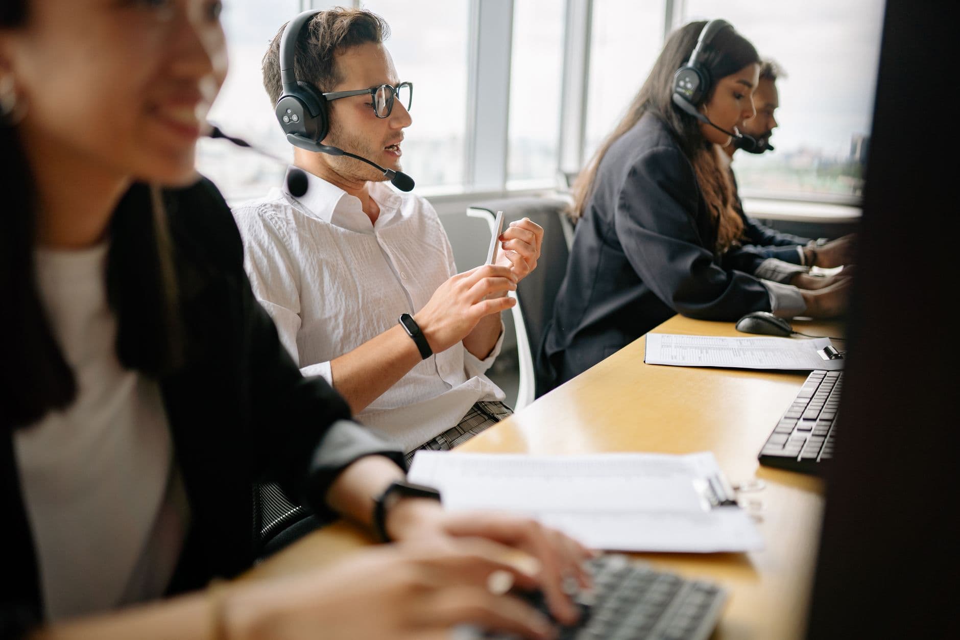 RDS Solutions for Call Centres & Software Teams — A diverse team of call center agents working together in a modern office setting.