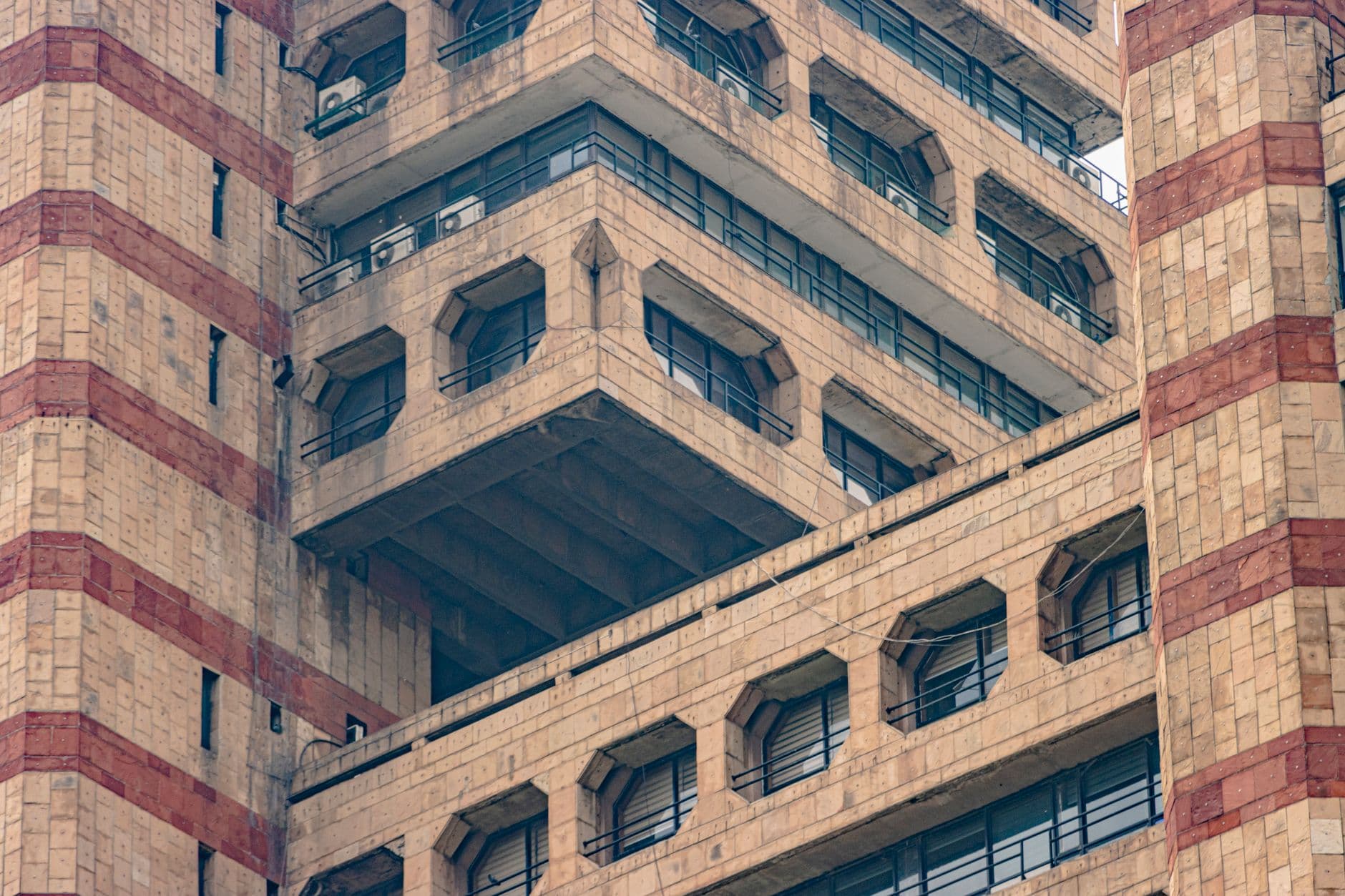 Server Solutions for Government Projects — Close-up of brutalist architecture featuring geometric patterns in New Delhi, India.