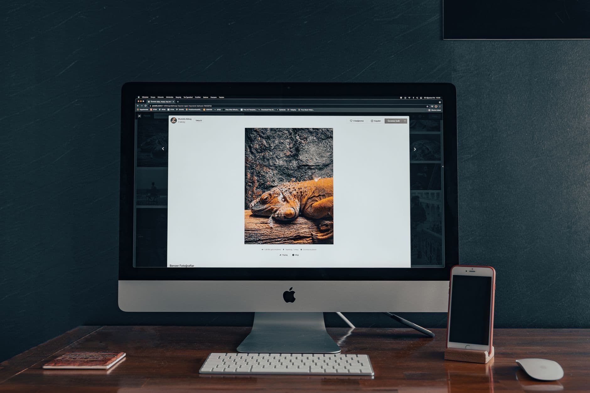 VPS Hosting for Web Designers — Stylish indoor workspace with a computer and smartphone on a wooden desk.